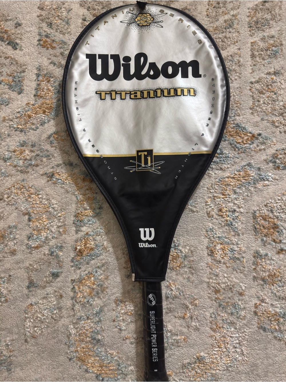Wilson Titanium Tennis Racket Cover in Black, White and Gold